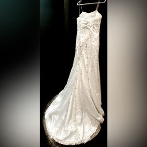 The Bridal Gallery size 12 snow white wedding dress.